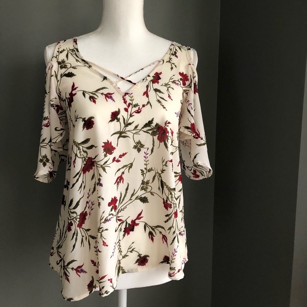 Off white cut out shoulder blouse